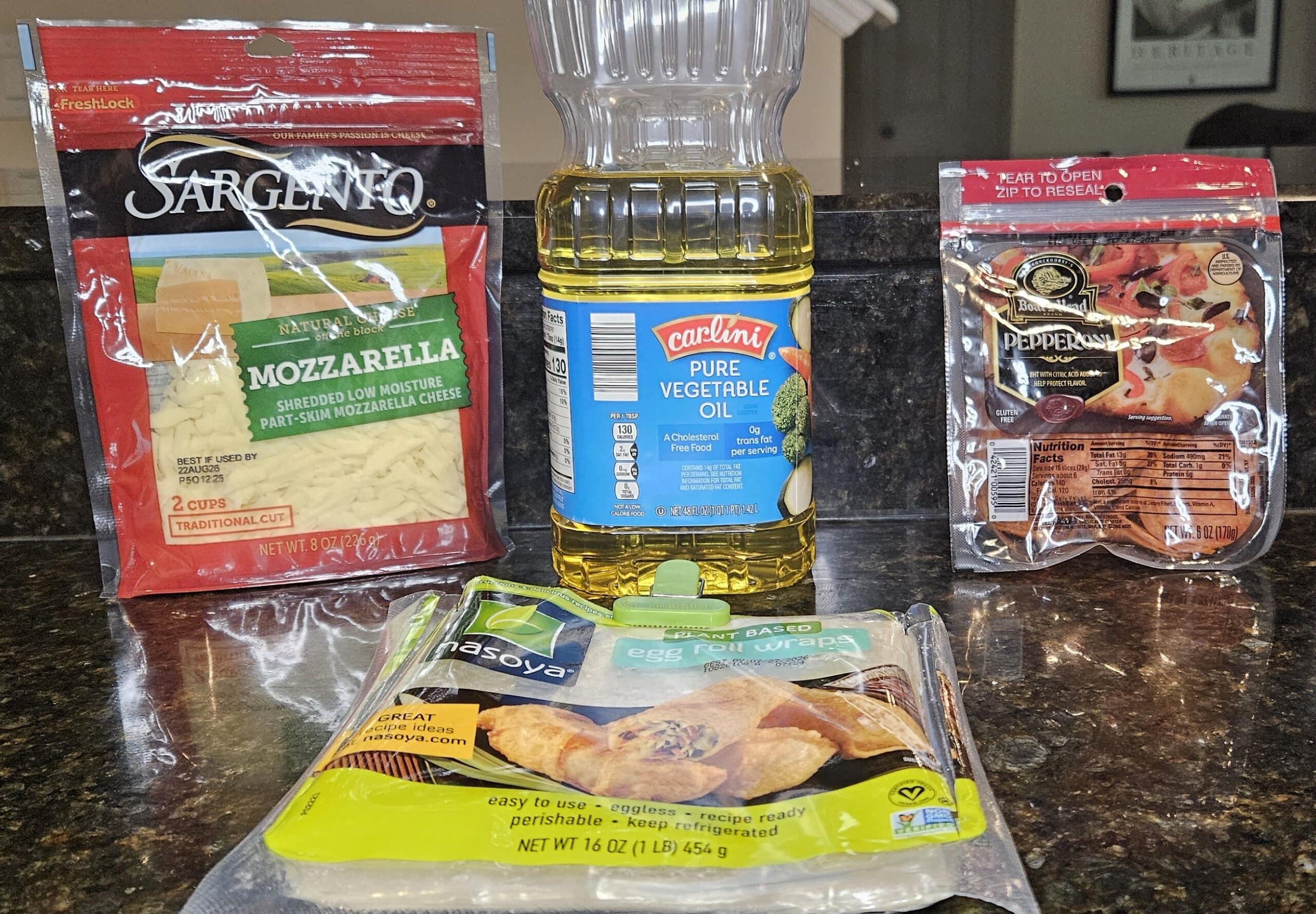 Disney Pepperoni Spring Rolls Recipe Ingredients: Shredded Mozzarella, Vegetable Oil, Pepperoni, and Egg Roll Wrappers