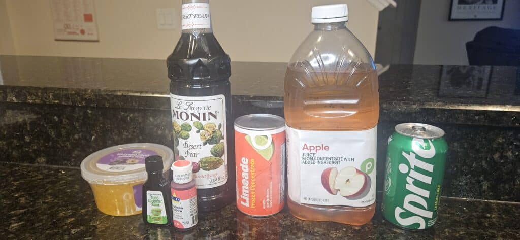 Night Blossom Animal Kingdom Recipe Ingredients: Passion Fruit Popping Boba, Green Food Coloring, Red Food Coloring, Desert Pear Syrup, Limeaid Frozen Concentrate, Apple Juice, and Sprite.