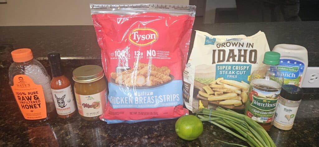 Mango-Habanero Chicken Strips Recipe Ingredients: Honey, Habanero Hot Sauce, Mango Jam, Chicken Tenders, Steak Fries, Lime, Green Onion, Garlic Powder, Ranch Dressing